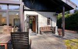Veranda und Hauseingang - Ferienhaus Rossberg****