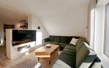 Wander-Lodge - Wohnbereich mit 55' Smart-TV