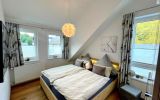 Fewo Bergzauber**** - Schlafzimmer mit TV