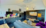 Fewo Bergzauber**** - Wohnzimmer mit Komfort-Küchenzeile