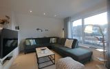 UplandLodge - Wohnbereich mit 55' Smart-TV