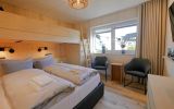 Junior-Schlafzimmer mit Sitzgruppe