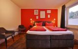 Upland Apartments/Fewo Zeitgeist - Schlafzimmer-1 mit Boxspringbett