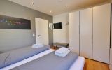Schlafzimmer mit TV - Fewo Bergzauber 2****