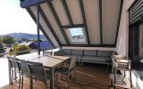 UplandLodge - überdachter, wohnlicher Balkon
